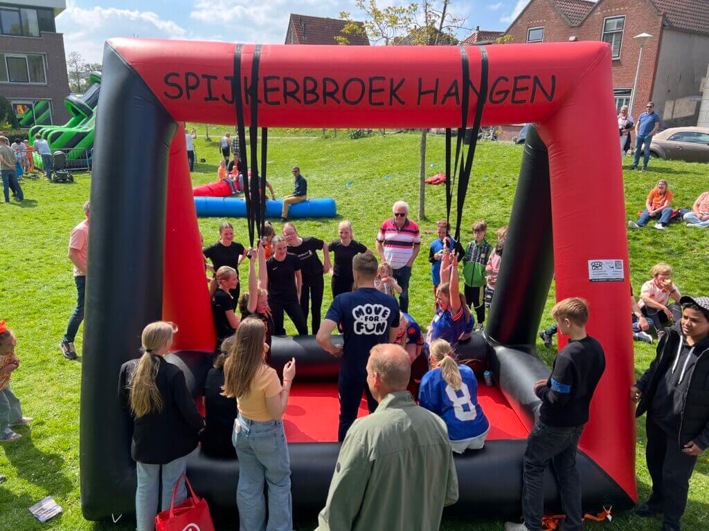 Zeskampspel spijkerbroek hangen