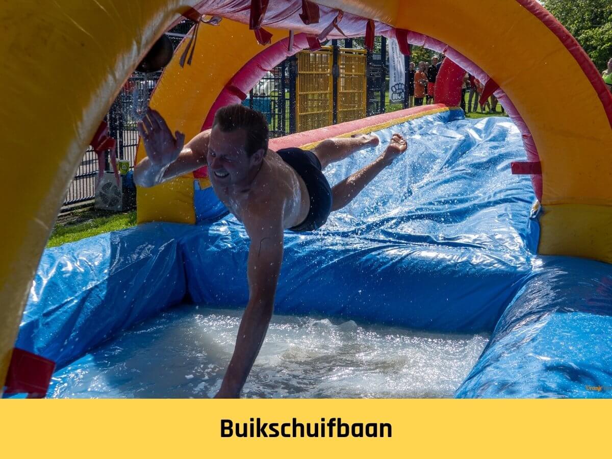 Zeskampspel-buikschuifbbaan Teamuitje-zeskamp-buikschuiven